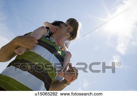 Girl (4) rides on man's shoulders, Grand Beach Provincial Park, Manitoba, Canada View Large Photo Image Stock Image - Girl (4) rides on man's shoulders, Grand Beach Provincial Park, Manitoba, Canada. Fotosearch