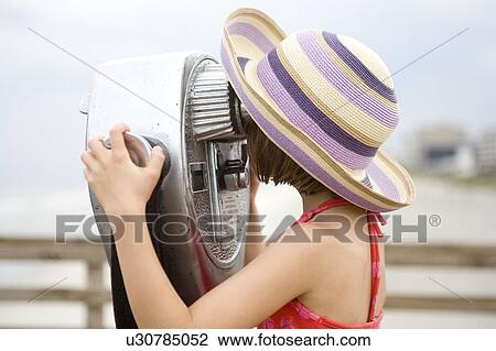 Stock Image - Girl - (5) with beach hat, Jacksonville, Florida. Fotosearch