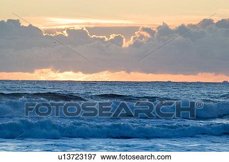 Stock Photo - Sunset, Chesterman Beach, Tofino, Vancouver Island, BC. Fotosearch