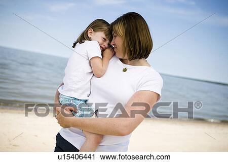 Woman and girl (4), cuddle, Grand Beach Provincial Park, Manitoba, Canada View Large Photo Image Stock Image - Woman and girl (4), cuddle, Grand Beach Provincial Park, Manitoba, Canada. Fotosearch