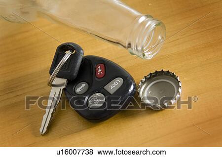 Beer bottle and car keys View Large Photo Image Stock Photo - Beer bottle and car keys. Fotosearch
