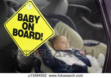 Stock Image - Infant in carseat. Fotosearch