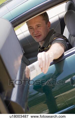Man delivering newspaper View Large Photo Image Stock Photo - Man delivering newspaper. Fotosearch