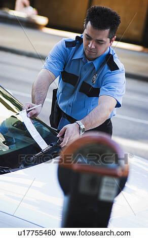 Policeman writing parking ticket View Large Photo Image Stock Image - Policeman writing parking ticket. Fotosearch