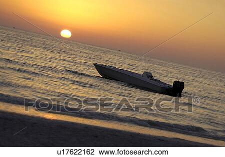 Stock Image - Boat on the ocean. Fotosearch