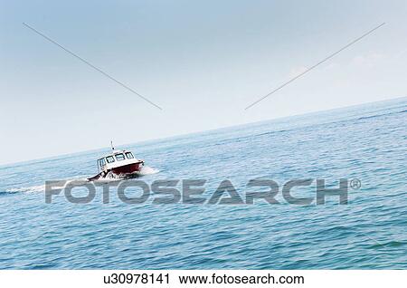 Stock Image - Boat on water. Fotosearch