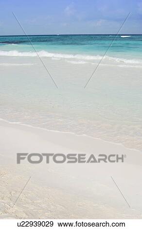 Stock Photo - Ocean waves coming ashore. Fotosearch
