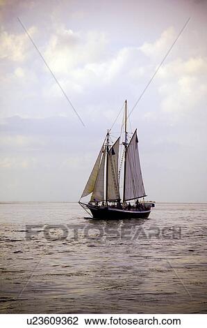 Sailboat on water View Large Photo Image Stock Image - Sailboat on water. Fotosearch