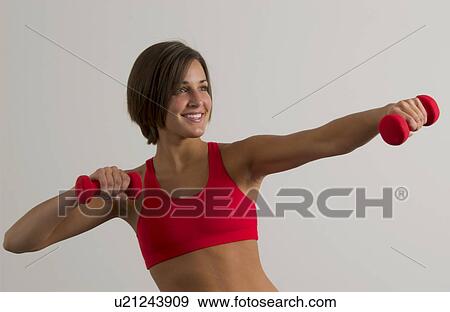 Stock Photo - Woman exercising. Fotosearch