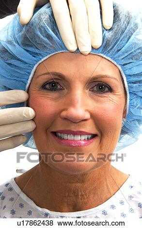 Stock Photo - Woman having cosmetic surgery Woman having cosmetic surgery . Fotosearch