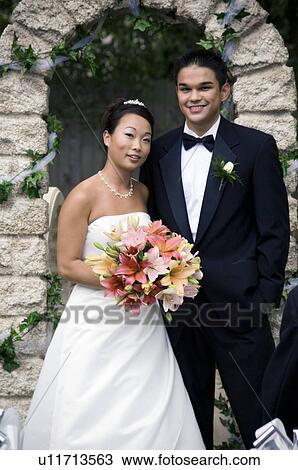 Bride and Groom at altar View Large Photo Image Stock Image - Bride and Groom at altar. Fotosearch