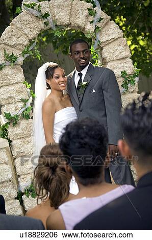 Bride and Groom at altar View Large Photo Image Stock Photograph - Bride and Groom at altar. Fotosearch