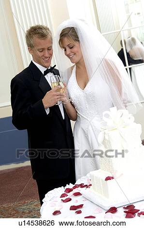 Bride and groom at reception View Large Photo Image Stock Photograph - Bride and groom at reception. Fotosearch