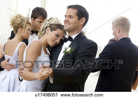 Bride and groom dancing View Large Photo Image Stock Image - Bride and groom dancing. Fotosearch