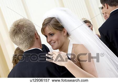 Stock Photo - Bride and groom dancing. Fotosearch