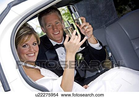 Bride and groom in limo View Large Photo Image Picture - Bride and groom in limo. Fotosearch
