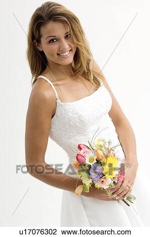 Bride holding bouquet View Large Photo Image Stock Image - Bride holding bouquet. Fotosearch