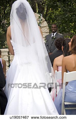 Bride walking down aisle View Large Photo Image Stock Photo - Bride walking down aisle. Fotosearch