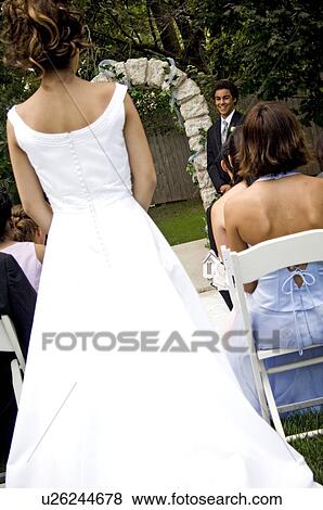 Bride walking down aisle View Large Photo Image Stock Photo - Bride walking down aisle. Fotosearch
