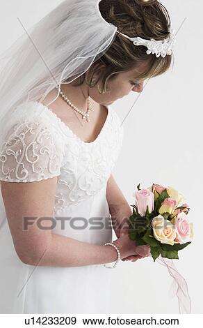 Stock Photo - Bride with bouquet. Fotosearch