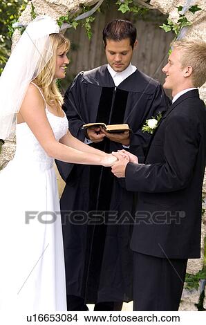 Couple getting married View Large Photo Image Picture - Couple getting married. Fotosearch