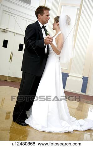 Stock Photo - Father dancing with bride. Fotosearch