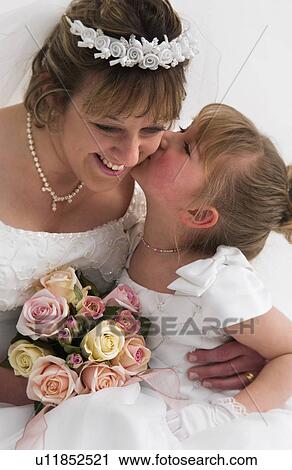 Flower girl and bride View Large Photo Image Stock Image - Flower girl and bride. Fotosearch