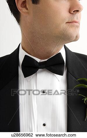 Stock Image - Man wearing tuxedo. Fotosearch