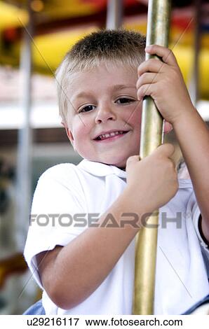 Boy at carnival View Large Photo Image Stock Photo - Boy at carnival. Fotosearch