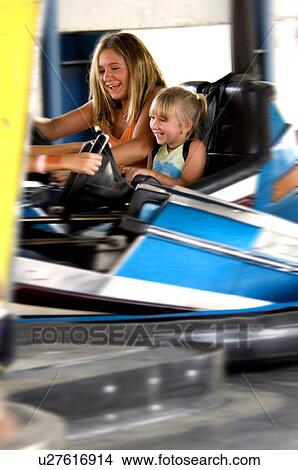 Kids on a carnival ride View Large Photo Image Picture - Kids on a carnival ride. Fotosearch