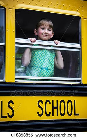 Stock Photography - Girl on school bus. Fotosearch