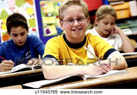 Stock Photo - Students in classroom. Fotosearch