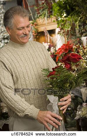 Picture - Customer in flower shop. Fotosearch