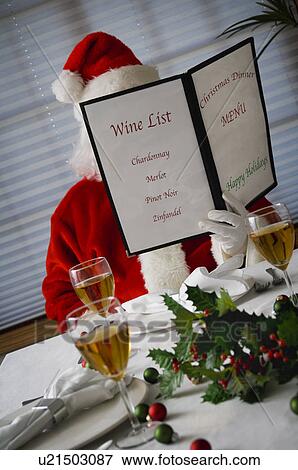 Stock Photo - Santa at Christmas dinner. Fotosearch
