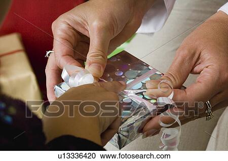 Wrapping gifts View Large Photo Image Stock Image - Wrapping gifts. Fotosearch