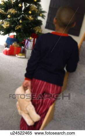 African American boy waiting for Christmas View Large Photo Image Stock Photography - African American boy waiting for Christmas. Fotosearch
