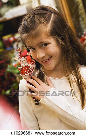 Girl christmas shopping View Large Photo Image Stock Photo - Girl christmas shopping. Fotosearch