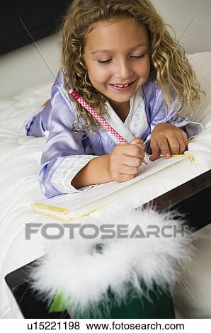 Girl writing letter to Santa View Large Photo Image Stock Photo - Girl writing letter to Santa. Fotosearch