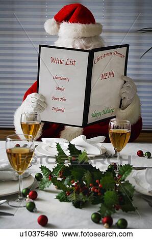 Santa at Christmas dinner View Large Photo Image Stock Image - Santa at Christmas dinner. Fotosearch