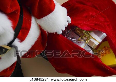Santa with bag of gifts View Large Photo Image Picture - Santa with bag of gifts. Fotosearch