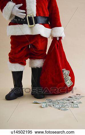 Santa with bag of money View Large Photo Image Stock Photography - Santa with bag of money. Fotosearch