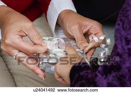 Wrapping gifts View Large Photo Image Stock Image - Wrapping gifts. Fotosearch
