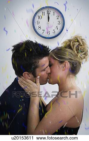 Stock Image - Couple kissing. Fotosearch