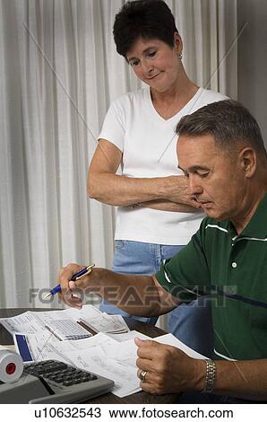 Senior couple paying bills View Large Photo Image Stock Image - Senior couple paying bills. Fotosearch