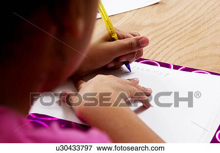 African American girl doing homework View Large Photo Image Stock Photo - African American girl doing homework. Fotosearch