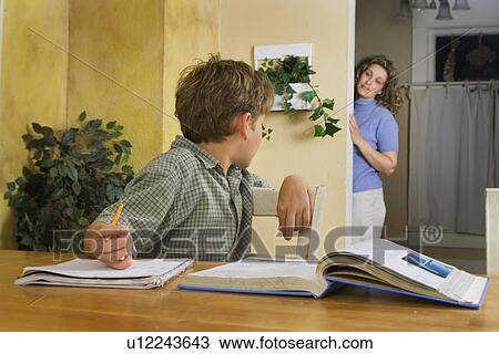 Boy doing homework View Large Photo Image Stock Image - Boy doing homework. Fotosearch