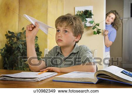 Boy doing homework View Large Photo Image Stock Photo - Boy doing homework. Fotosearch