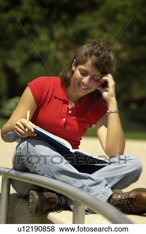 Stock Photo - Girl studying. Fotosearch