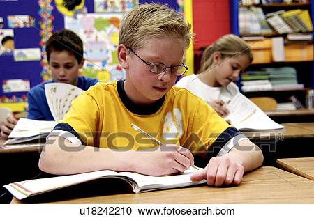 Stock Image - Students in classroom. Fotosearch