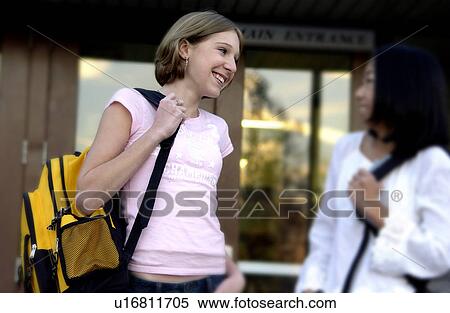 Stock Photography - Teenage girls talking. Fotosearch